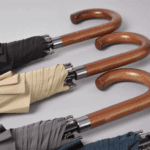 black umbrella wooden handles