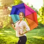 large vented rainbow umbrella girl