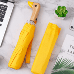 Gelber Entenkopf-Regenschirm