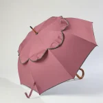 Custom dusty rose designer umbrella with vented scalloped canopy and curved wooden handle