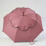 Dusty rose scalloped double canopy designer umbrella with black and white polka-dot trim