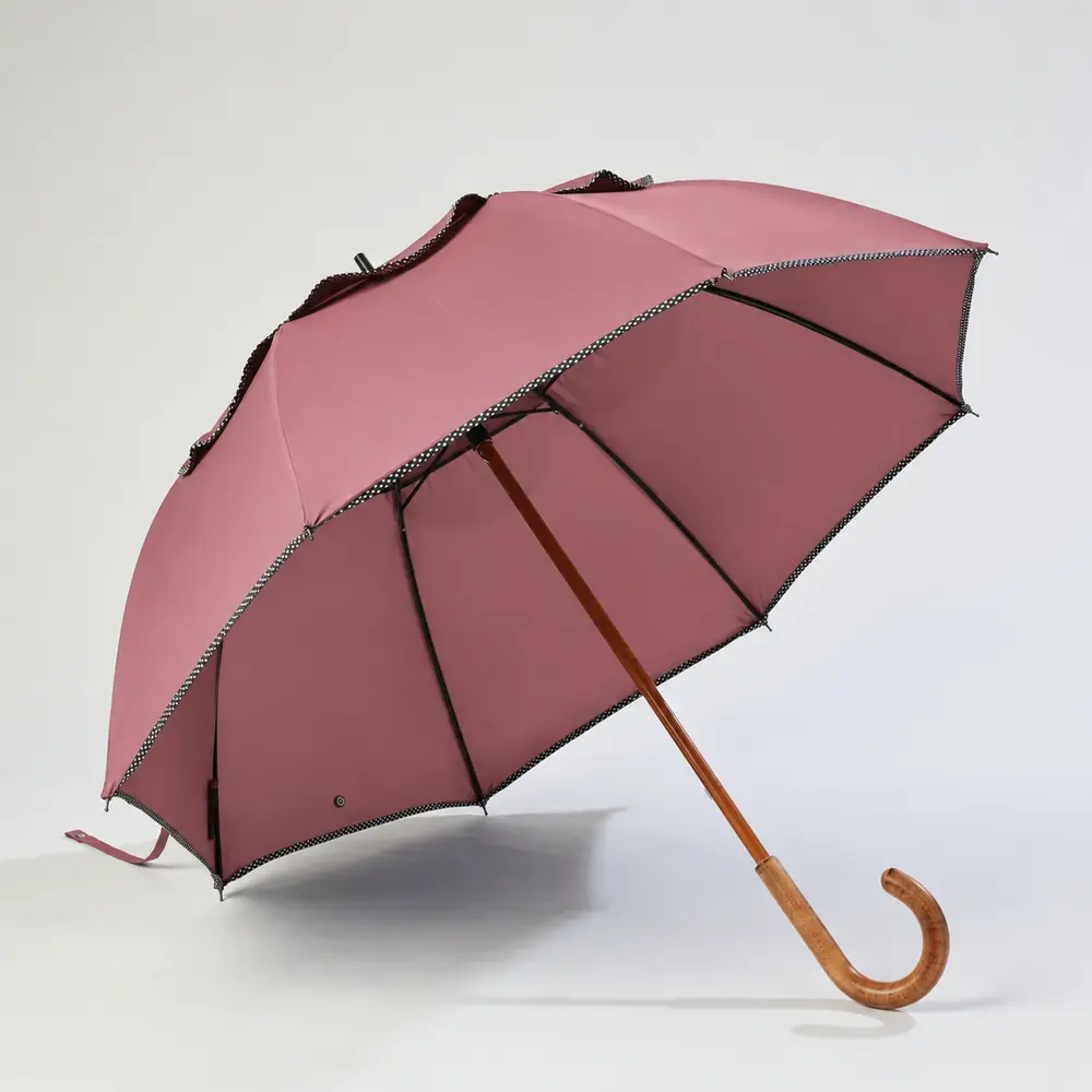 Inside view of a windproof custom designer umbrella with double canopy and wooden shaft
